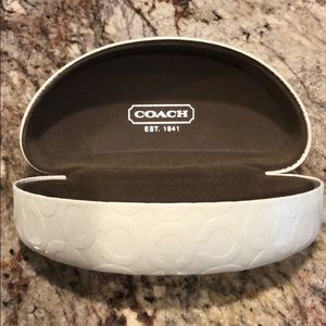 Used Coach clam shell sunglasses case.
